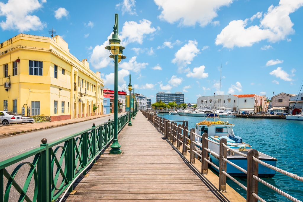 Bridgetown promenade Barbados, waterfront, houses, shops and boats