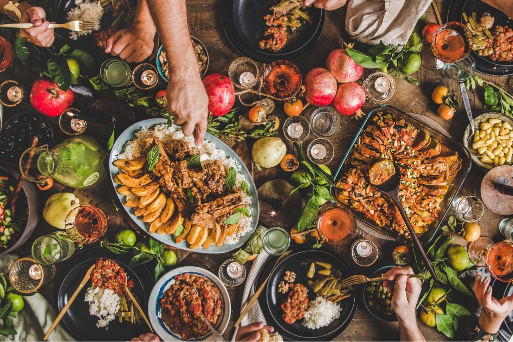 Caribbean Christmas food feast - Roasted or glazed meats—such as pork, chicken or goat