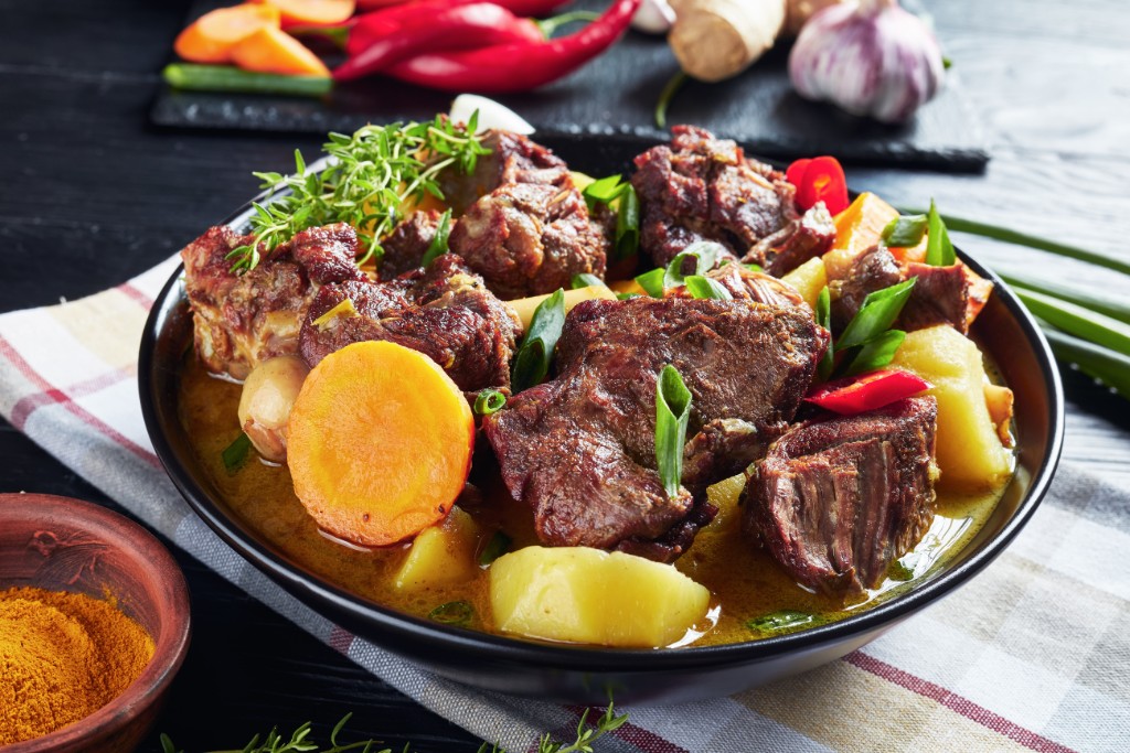 Curried pork goat and rice