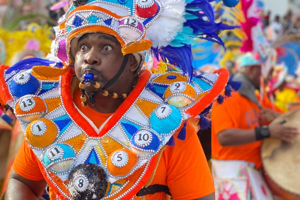 caribbean man dancing in the Junkanoo festival in The Bahamas at christmas