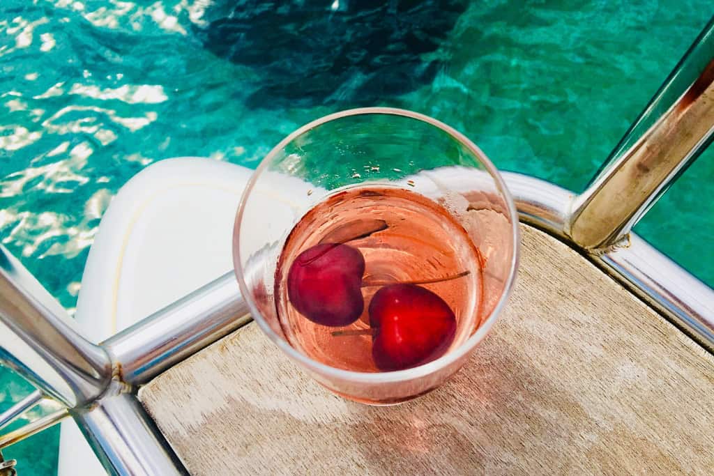 Cocktail with cherries aboard a cruise ship