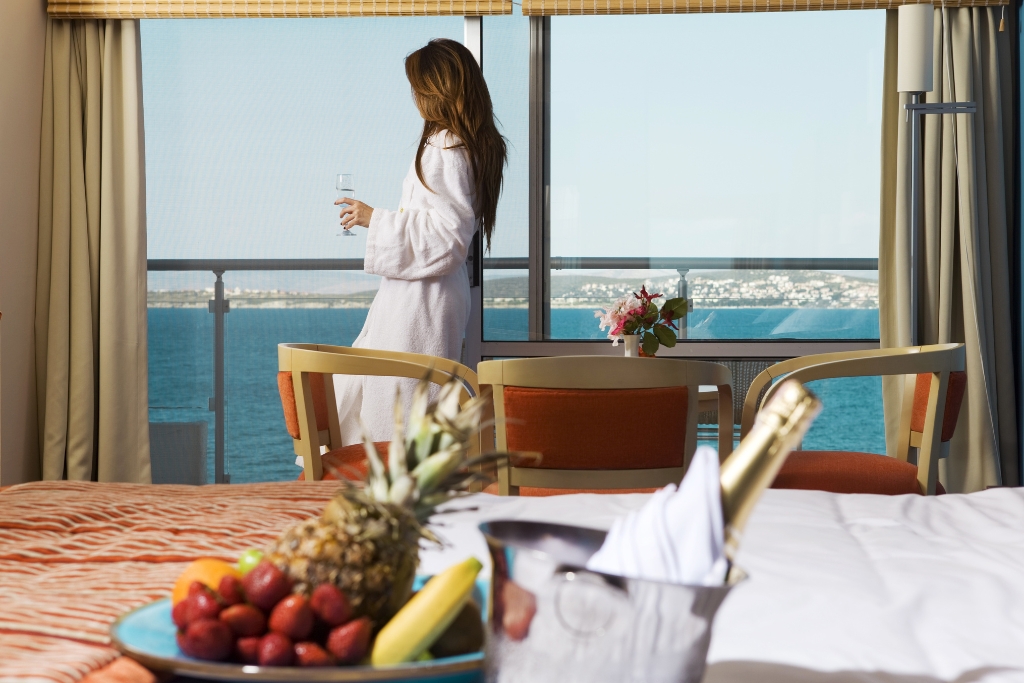 Cruise and stay holiday suite welcome drinks, dressing gown and sea view